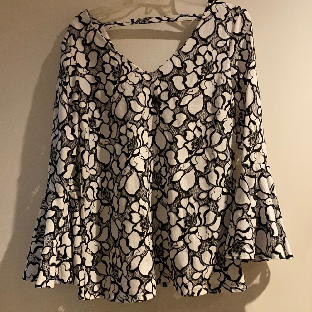 Lacy Black and White top with Bell Sleeves.